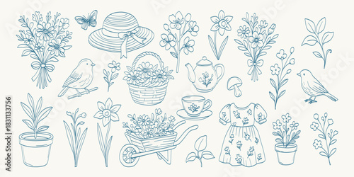 A blue and white image of flowers, a bird, and a basket. The flowers are arranged in a vase, and the bird is perched on a branch. The basket is filled with flowers and a tea set