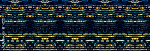 Multi-stories office building at night with worker working overtime. late night at office. lighting and working people within