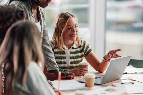 Women collaborating on a business project in office
