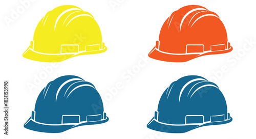 Four colorful construction helmets displayed against a clean white background