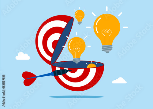 Target and dart with light bulb in half of a open target board. Concentrate on purpose. Think big, aspiration to win and success in business, big idea from creativity and imagination to overcome fear.