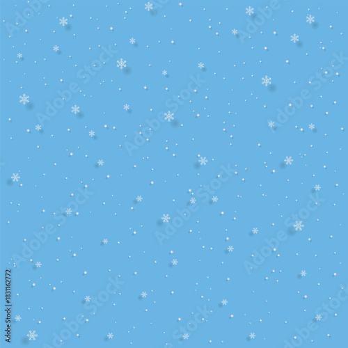 Seamless winter background with falling snow and snowflakes on a blue backdrop. Perfect for Christmas cards, wrapping paper, invitations, prints and festive seasonal design projects.