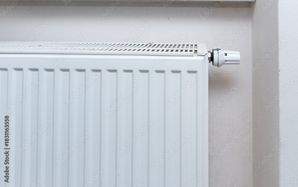 custom made wallpaper toronto digitalWhite radiator installed in a modern home providing heat during winter. Its design integrates seamlessly into the room's decor, ensuring comfort and warmth.
