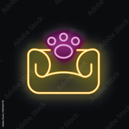 Neon sign of a dog bed with a paw print glowing on a black background