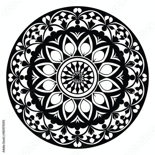 Intricate black and white floral mandala displays exquisite symmetry and balance within its circular structure