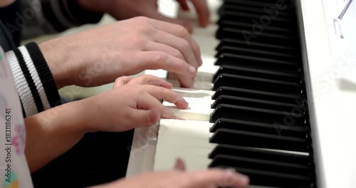Piano lessons creating musical memories father teaches daughter at home in the afternoon