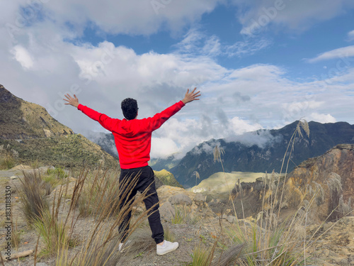Man Celebrating Freedom On Mountains
