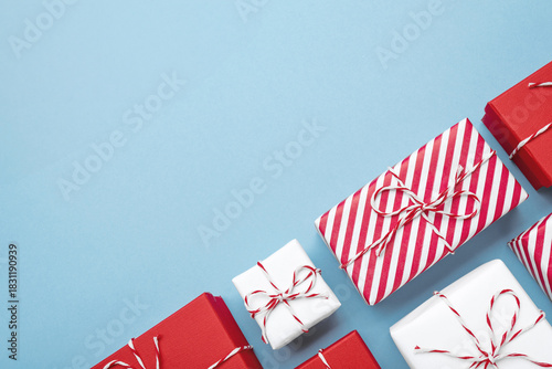 Gift boxes on color background, flat lay, space for text