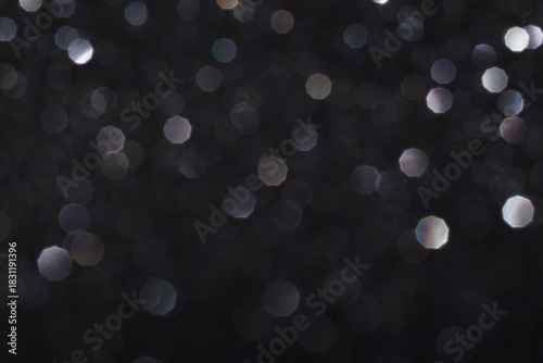 Glitter vintage lights background, light silver and black