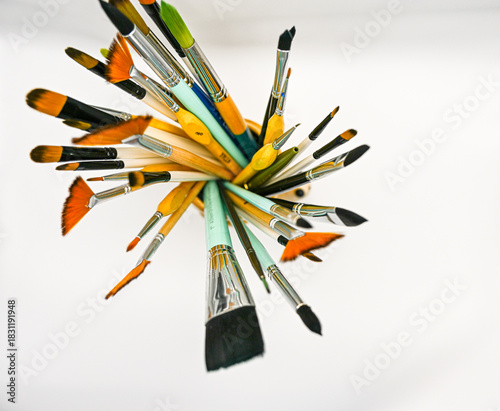 Cup of paintbrushes as seen from above