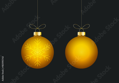 Bolas navideñas doradas, una con copo de nieve, sobre fondo oscuro