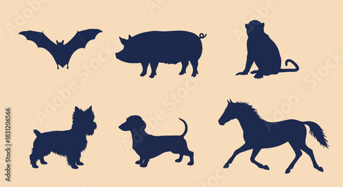 vector Collection of animal silhouettes vector illustration of bat pig monkey dog and horse isolated on beige background