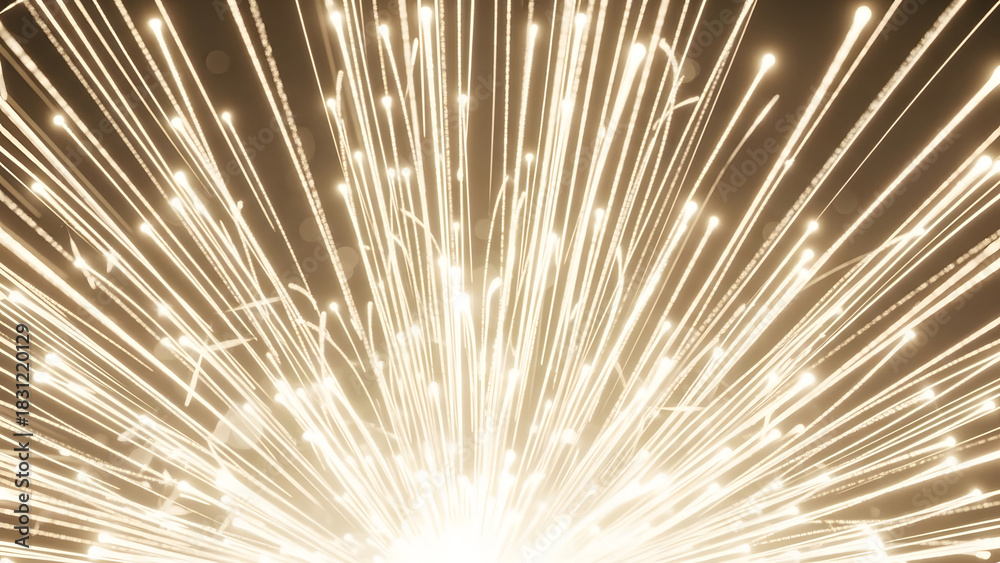 Obraz premium Golden Sparkles in the Night Sky: A radiant explosion of light streaks across the dark, evoking a sense of wonder and the boundless possibilities of the cosmos.