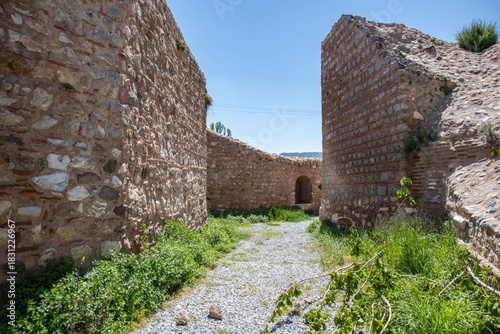 Fototapeta Naklejka Na Ścianę i Meble -  Iznik Castle gate, walls and water channel in Türkiye 2025 