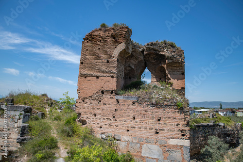 Fototapeta Naklejka Na Ścianę i Meble -  Iznik Castle gate, walls and water channel in Türkiye 2025 