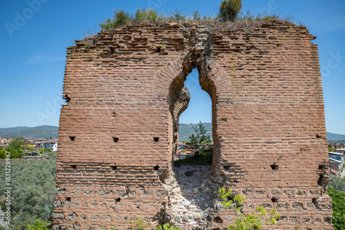 Fototapeta Naklejka Na Ścianę i Meble -  Iznik Castle gate, walls and water channel in Türkiye 2025 