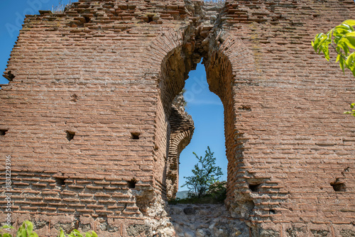 Fototapeta Naklejka Na Ścianę i Meble -  Iznik Castle gate, walls and water channel in Türkiye 2025 