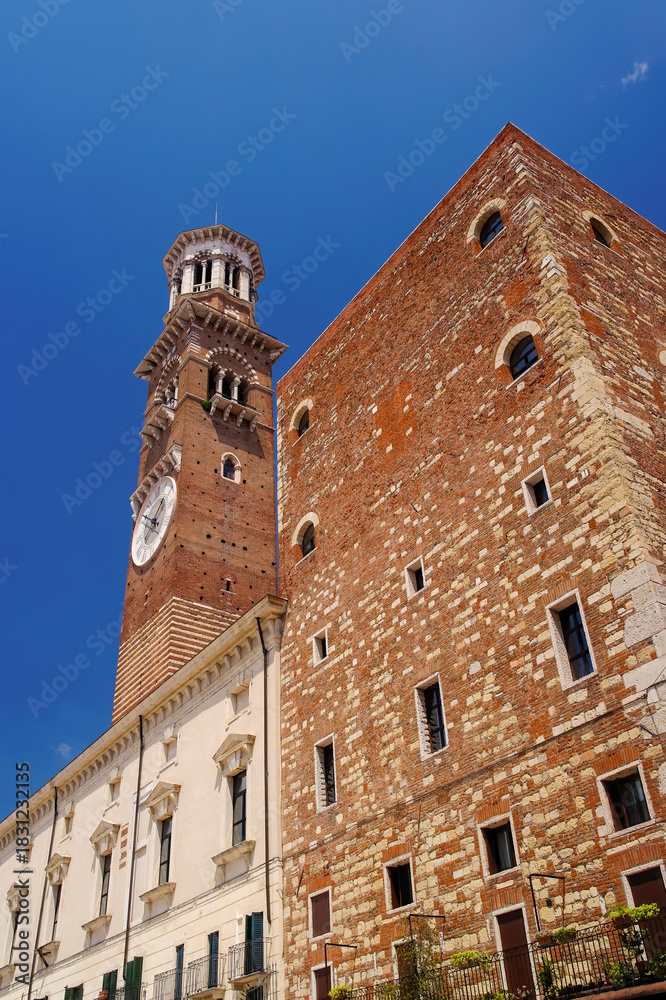 Fototapeta premium Torre dei Lamberti (Lamberti Tower) on Piazza delle Erbe (Market's square) in Verona, Italy