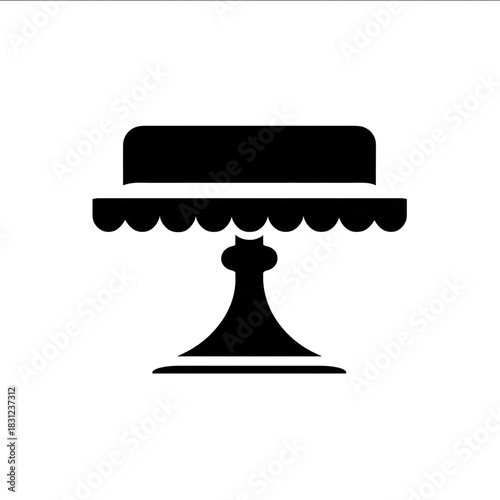 an icon of a cake pedestal blakc and white.