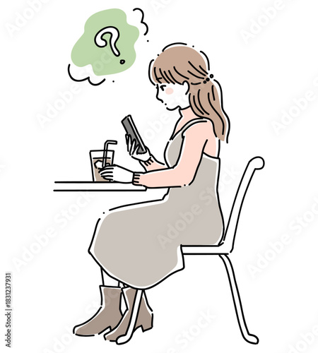 カフェでスマホを見る女性4