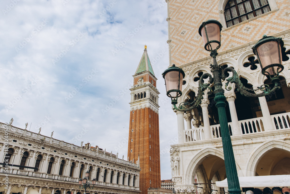 Fototapeta premium St. Mark's Campanile towering over Piazza San Marco Venice