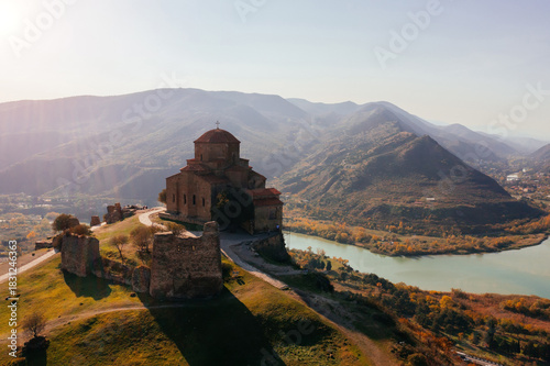 Cuadro en lienzo Drone aerial view of Jvari monastery and the mountains in Mtskheta, Georgia
