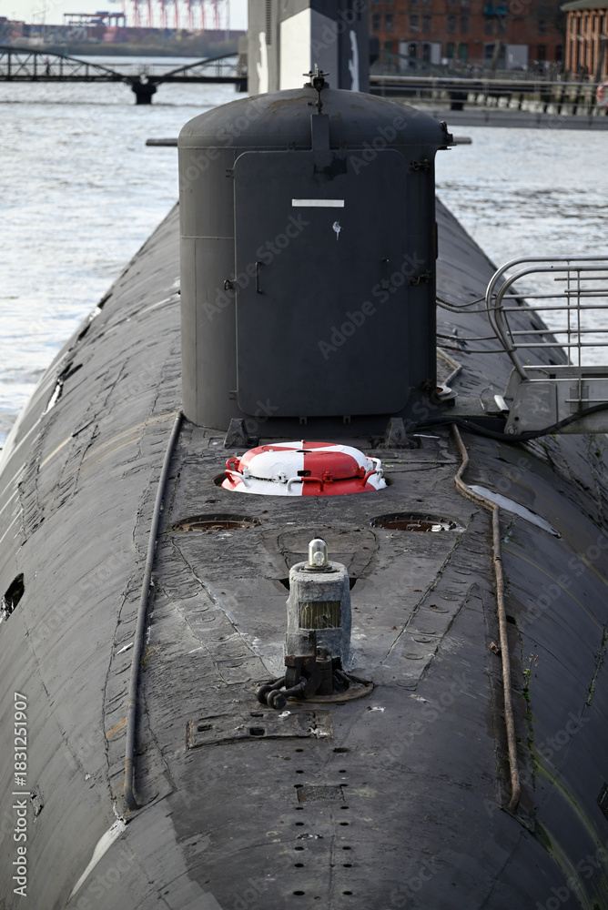 Fototapeta premium Russian Submarine in the Hamburg Port. Old russian submarine with seagulls at the Hamburg Harbor. Landungsbrücken.