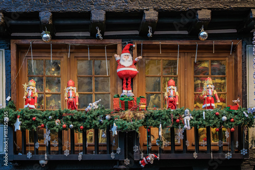 Fototapeta Naklejka Na Ścianę i Meble -  Festive decorations on half timbered houses, Colmar Christmas Market in France