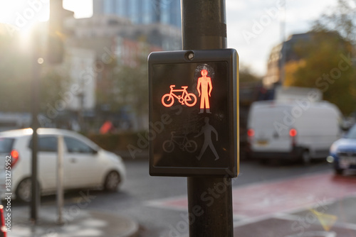 Traffic signal with bicycles and cars
