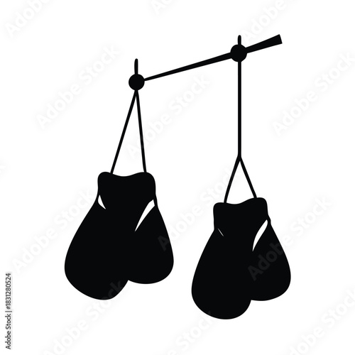 Silhouette of two black boxing gloves hanging from a horizontal bar against white