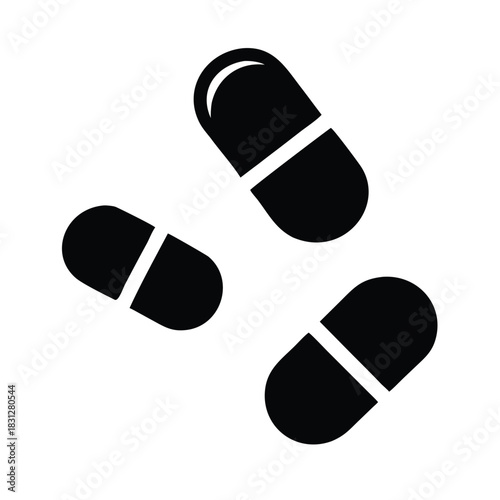 Silhouette of Three black pills isolated on a white background view 