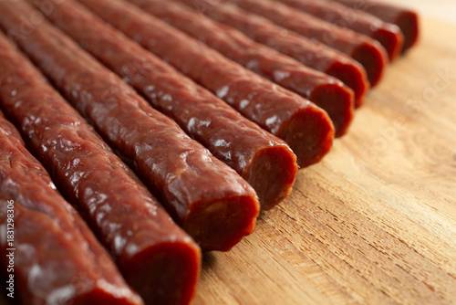 Canvas Print A closeup view of a layer of beef sticks.
