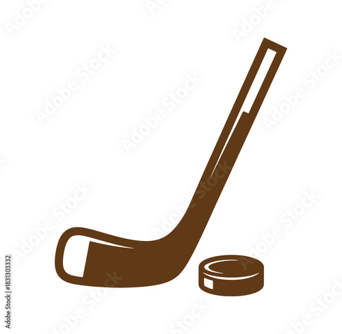 Brown hockey stick and puck isolated on white representing winter sports and competition