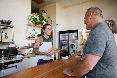 Cashier interacting with a customer