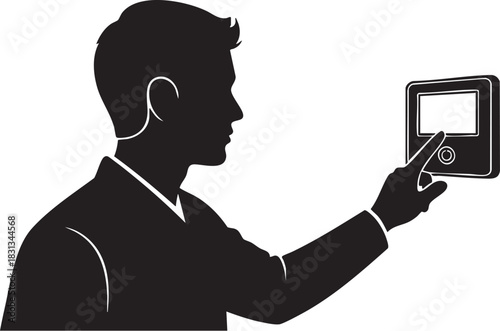 Silhouette of man interacting with a digital control panel screen