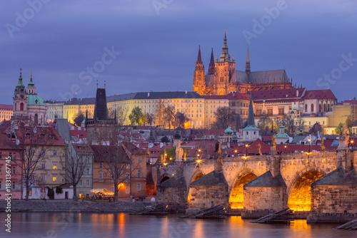 Charles Bridge and historic complex at sunset in Prague, Czech Republic