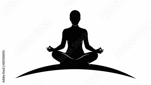 Silhouette of a person meditating in a lotus position.