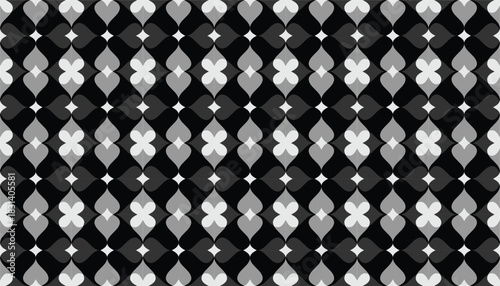 A seamless black-and-white geometric pattern featuring repeated petal-shaped motifs arranged in a tight grid. The alternating grayscale tones create a rhythmic visual flow