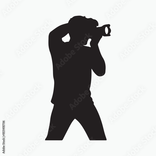 Silhouette of a photographer taking a picture