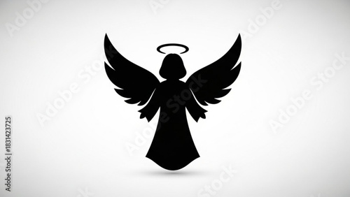 Angel silhouette vector illustration with wings and halo for christmas and religious designs and arts
