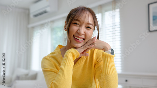 Work from home office desk asia people digital nomad young gen z teen female smile look at camera sit self relax tech talent remote career life balance happy hybrid stock trader job study learn online