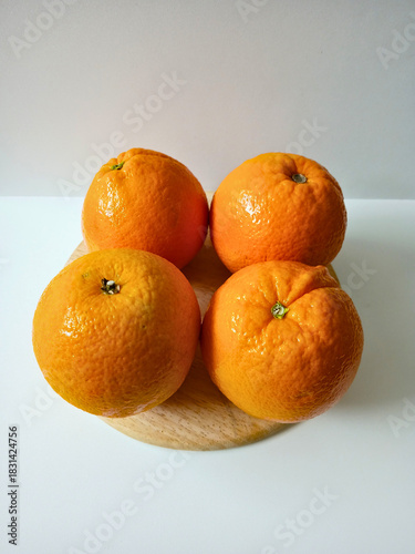 Wallpaper Mural orange fruits on table Torontodigital.ca