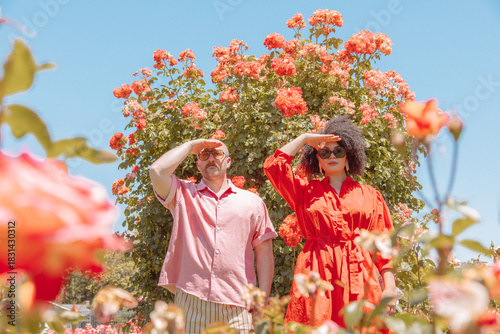 Couple in rose garden