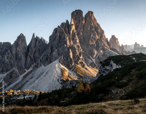 Jagged rocky mountain range with sunlit peaks