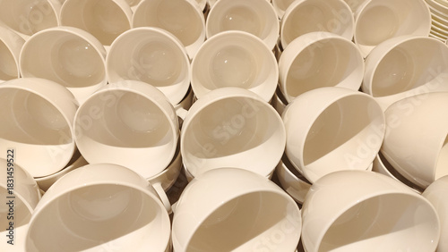 Rows of Stacked White Ceramic Cups