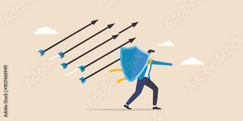 Businessman defends against incoming arrows with a shield