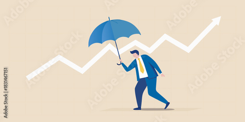 Businessman holds umbrella against upward trend line