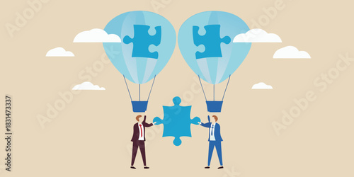 Businessmen connecting puzzle pieces under hot air balloons