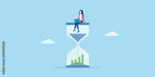 Woman working on laptop on top of hourglass with growing bar chart