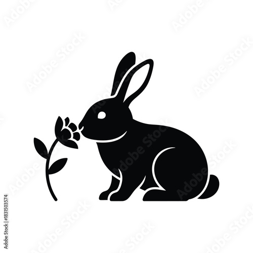 Cute rabbit sniffing spring flower silhouette vector icon